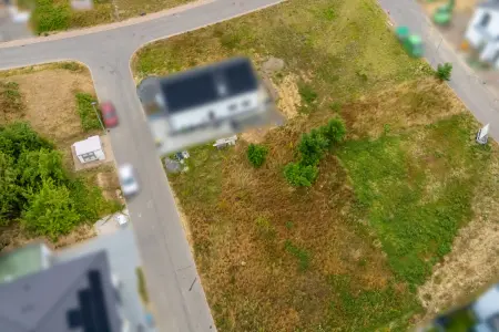 Luftansichtder Immobilien: Attraktives Baugrundstück im Neubaugebiet "Ob dem Obern Dorf" (Foto)