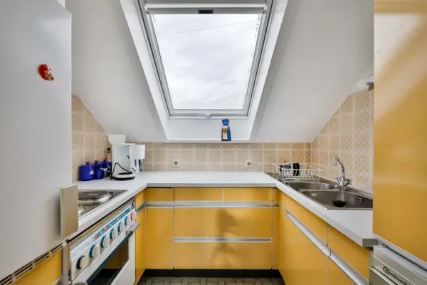 Kücheder Immobilien: Dachgeschoss-Wohnung in ruhiger Lage (Foto)