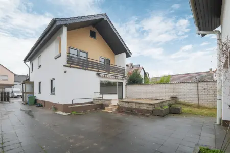 Ansicht Innenhofder Immobilien: Genug Platz für die ganze Familie - Einfamilienhaus in Eggenstein mit tollem Grundstück (Foto)