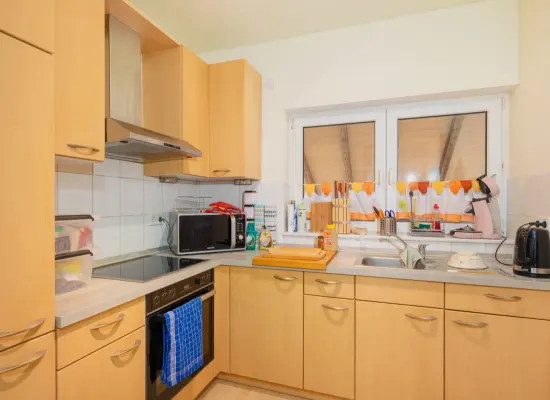 Küche Wohnung OG linksder Immobilien: Freistehende Immobilie in Linkenheim – Ruhige Lage & hochwertige Bauqualität! (Foto)