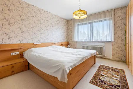 Schlafzimmerder Immobilien: Charmante 2-Zi.-ETW – Gut geschnitten & bereit für frischen Wind! (Foto)