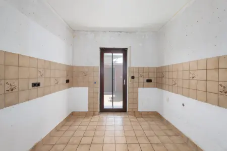 Kücheder Immobilien: Ebenerdige 3,5-Zimmer-ETW mit Terrasse und großem Gartenanteil! (Foto)