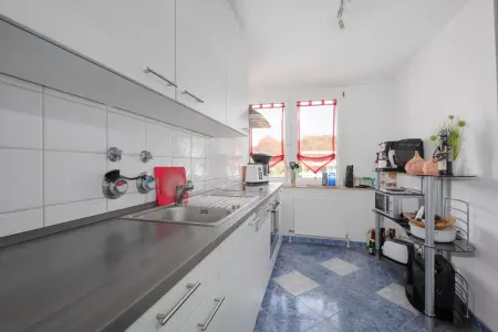 Kücheder Immobilien: Gepflegte 2-Zimmer-Wohnung mit Balkon in Eisingen – Ideal für Singles, Paare & Kapitalanleger! (Foto)