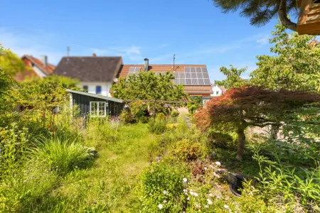 Rückansicht vom Gartender Immobilien: Wohnhaus mit Laden und Ausbaupotential (Foto)