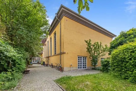 Kirchengebäude der Immobilie: Himmlisch wohnen – ein architektonisches Meisterstück für Visionäre! (Foto)