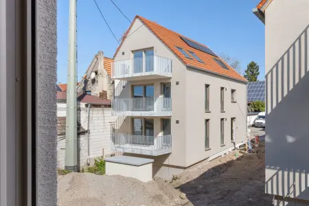 Haus Ader Immobilien: Licht, Raum & Stil – Ihre neue Wohnung im Neubau mit Südbalkon (Foto)