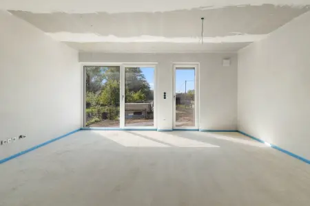 Wohnzimmer der Immobilie: „Familienglück im Reihenhaus – Viel Raum, viel Licht und Ihr eigener Garten“ (Titelbild)