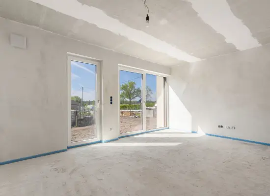 Wohnzimmer der Immobilie: „Reihenhaus-Revolution – Dein modernes Zuhause mit viel Platz und Blick ins Grüne (Foto)