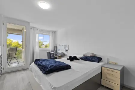Schlafzimmerder Immobilien: Komfortable 2,5-Zimmer-Eigentumswohnung mit Wintergarten und Garage! (Foto)