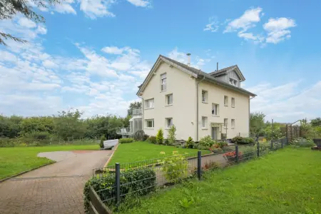 Rückansicht der Immobilie: Moderne Loftwohnung - Naturnah und hyggelig! (Foto)