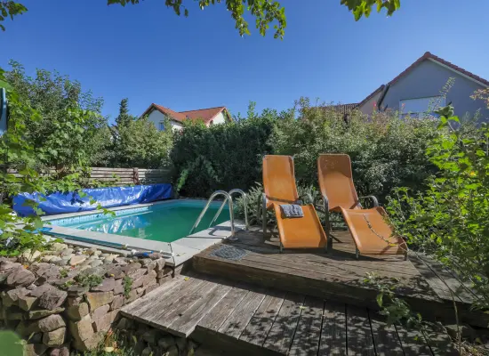 Pool der Immobilie: Frei stehendes KfW-40 Haus mit Pool und Garten in Neureut-Kirchfeld (Foto)