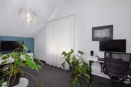 Zimmer DG der Immobilie: Moderne Doppelhaushälfte (Foto)