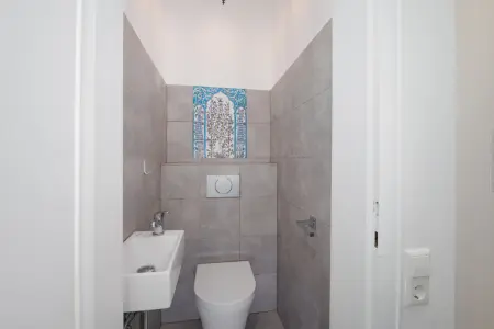 Gästetoilette Zwischengeschoss der Immobilie: Modernes Einfamilienhaus in ruhiger, naturnaher Lage mit Panoramablick! (Foto)