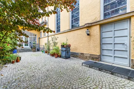Kirche Eingenang der Immobilien: Himmlisch wohnen – ein architektonisches Meisterstück für Visionäre! (Foto)