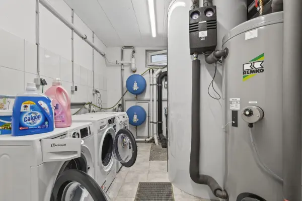 Waschküche der Immobilie: „Exklusives 3-Zimmer-Juwel mit Balkon und eigenem Garten“ (Foto)